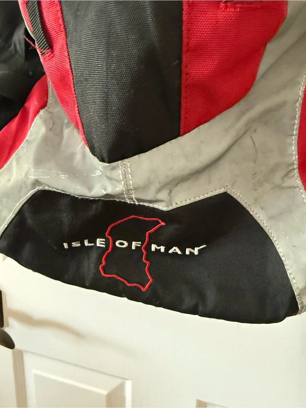 Isle of Man TT motorcycle racing backpack 18” long does have some wear as shown.